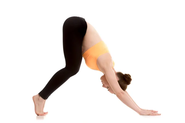 Downward-facing dog yoga pose for beginner — Stock Photo, Image