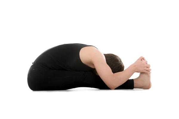 Seated Forward Bend yoga pose — Stock Photo, Image