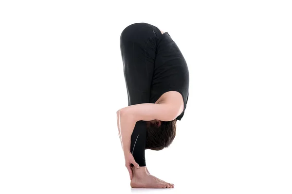 站立体前屈，强烈伸展瑜伽姿势 — 图库照片