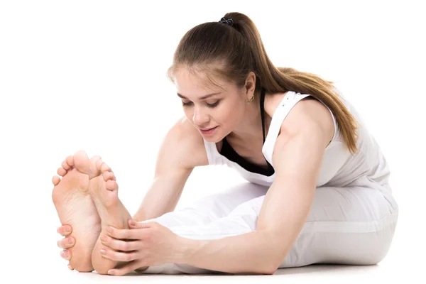 Seated Forward Bend yoga pose — Stock Photo, Image