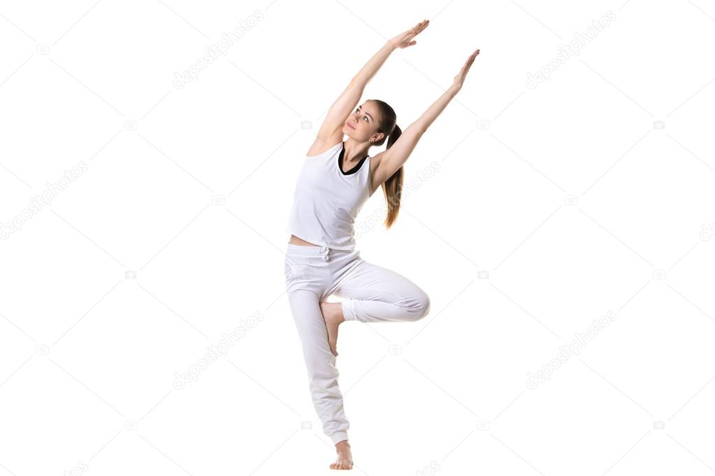 Bending in Yoga tree pose 