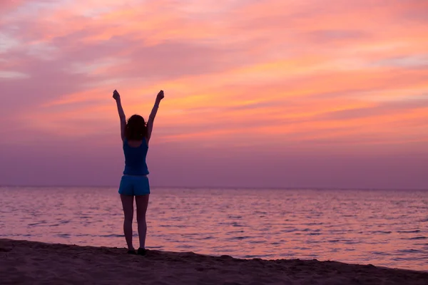 Young happy woman at seashore — Stock Photo, Image