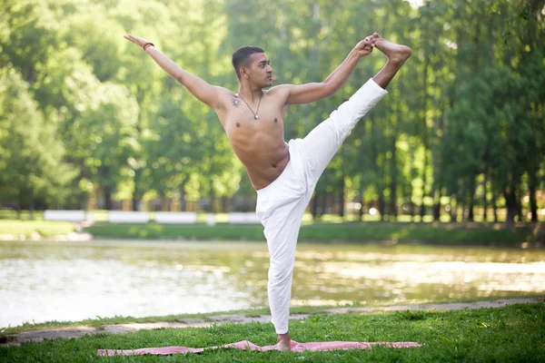 Indian young man practicing yoga — Stock Photo, Image