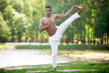  Yoga practice on riverbank 