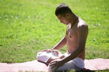 Lotus Pose in park