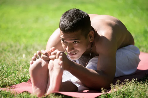 Indian yogi in park