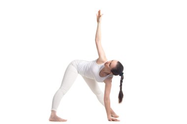 Yogi female doing Yoga trikonasana pose