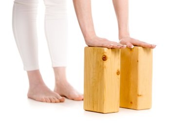 Ardha Uttanasana pose with props, closeup
