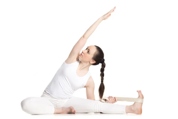 Yoga with props, Revolved Head to Knee pose — 图库照片
