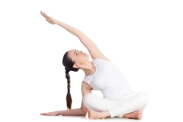 Side bending Sukhasana yoga pose — 图库照片