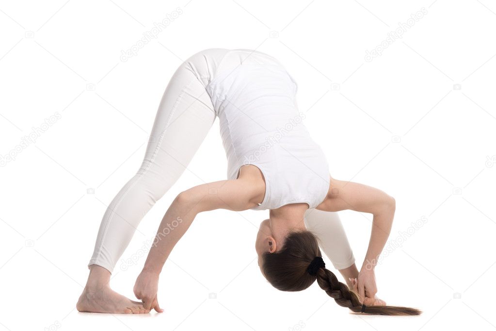 Yogi female standing in Wide Stance Forward Bend