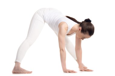 Yogi female doing Standing Straddle Forward Bend
