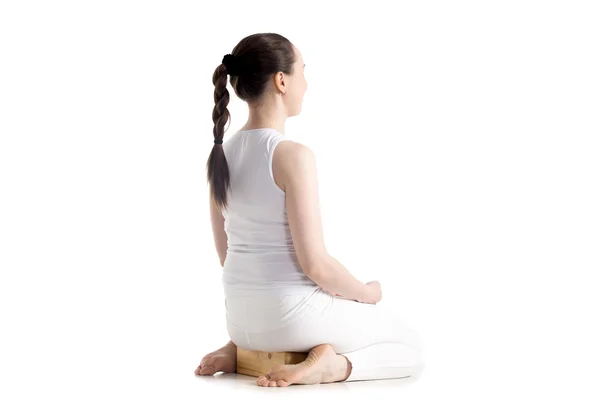 Yoga with props, vajrasana pose — Stock Photo, Image