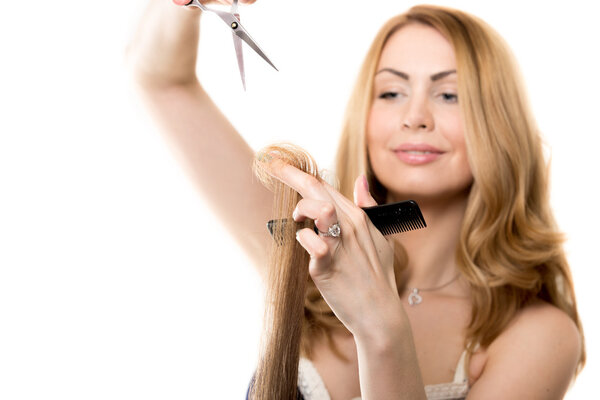 Barber woman cutting hair