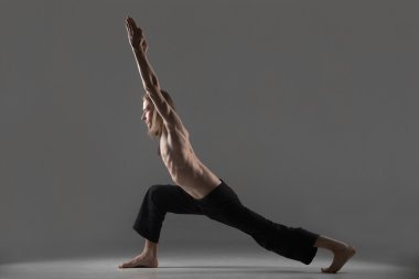 Variation of virabhadrasana 1 yoga pose 