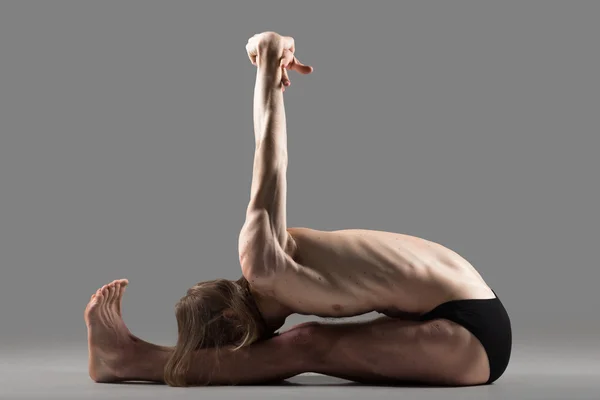 Variation of seated Forward Bend pose — Stock Photo, Image