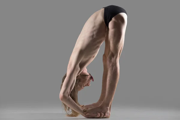 Hands to Feet Pose (Padahastasana) yoga posture — 图库照片