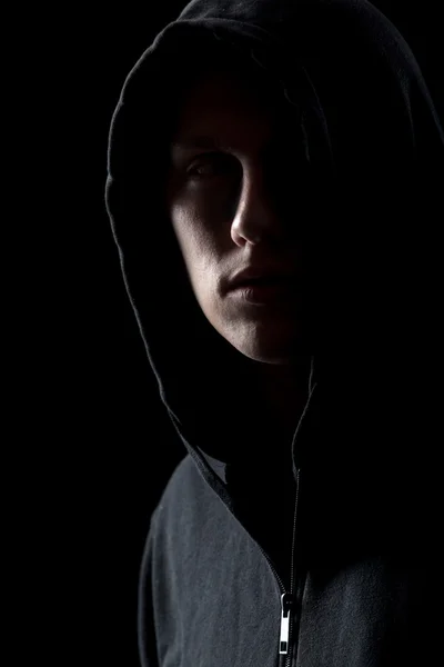 Portrait of mysterious man in the dark — Stock Photo, Image