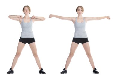Sporty woman doing warming up exercises