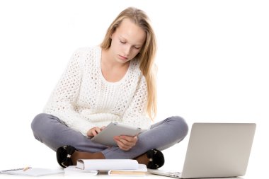 Girl studying with tablet