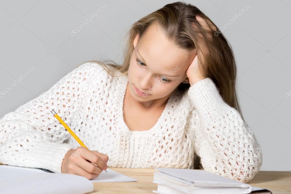 Schoolgirl having problems with studying