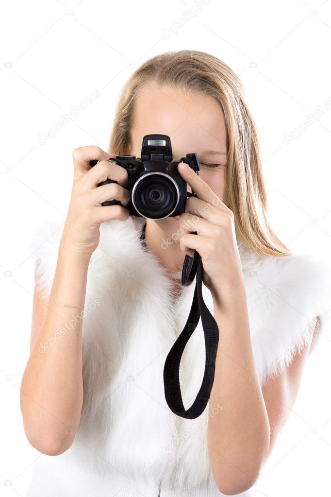 Portrait of happy girl taking pictures