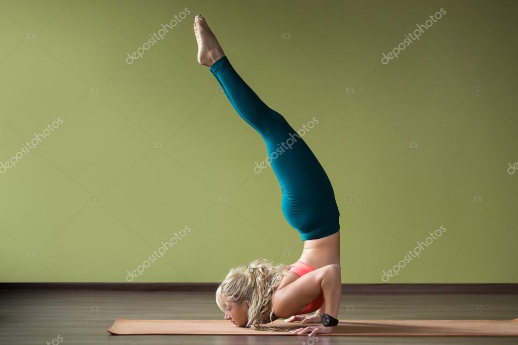 Fierce bird yoga Pose — Stock Photo © fizkes 91843478