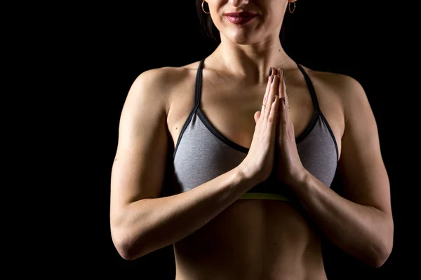 Sporty fit beautiful young woman Namaste gesture — Stock Photo, Image