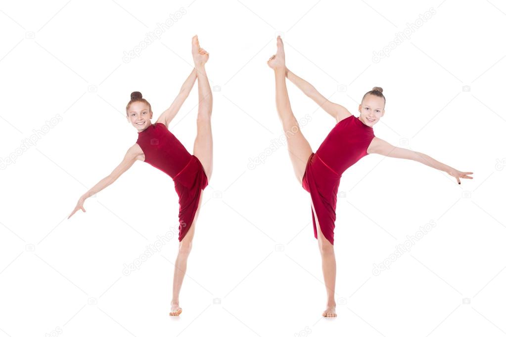 Two dancer girls doing standing splits