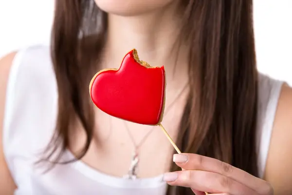 Heart shaped biscuit with bite — Stock Photo, Image