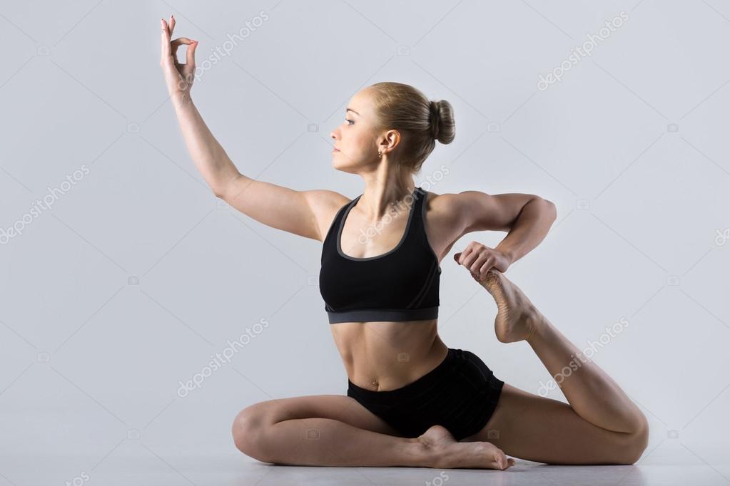 Eka Pada Rajakapotasana Stock Photo By C Fizkes