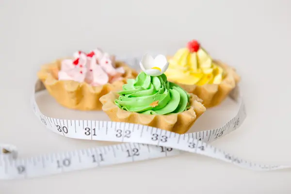 Obesity concept cakes — Stok fotoğraf