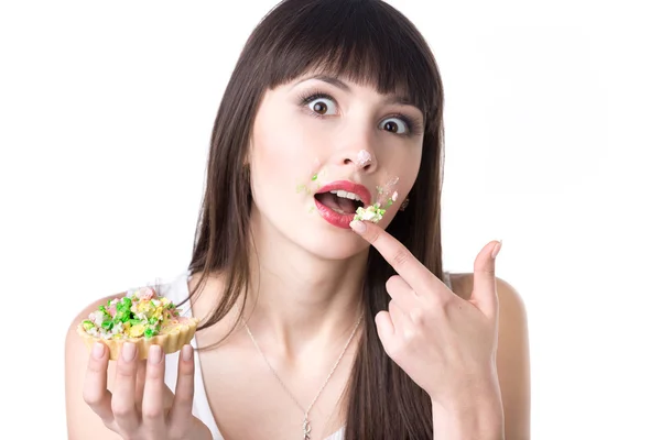 Dieting woman got caught while eating cake — Stock Photo, Image