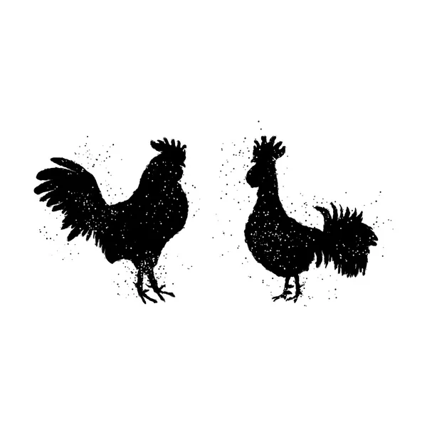 Two black rooster silhouettes — Stock Vector