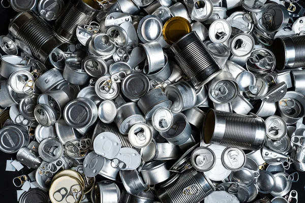 Recycle empty cans and tin for food and drink. Aluminum soda cans and food jars. Sorted metal trash and garbage ready for recycling. Steel rubbish. Zero waste and no pollution.