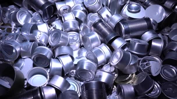 Large amount of metal tins, cans and jars for recycling. Aluminum metal food and drink sorted scraps. Steel packaging. Zero waste and recycle of domestic waste at home concept. No pollution. — Stock Video