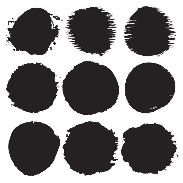Scratched blots of black paint — Stock Vector