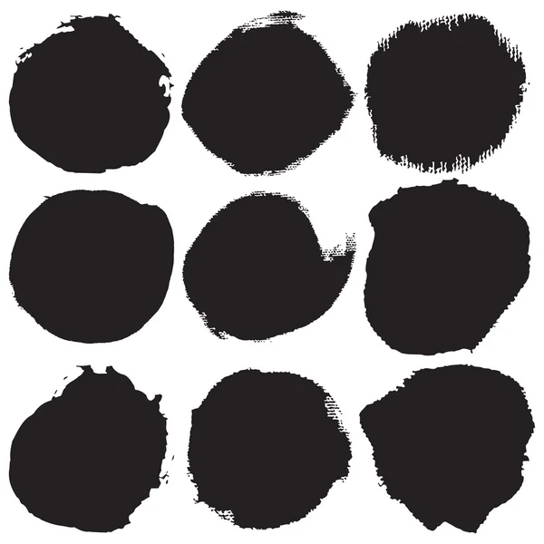 Scratched blots of black paint — Stock Vector