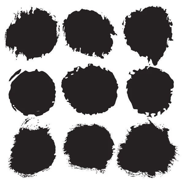 Scratched blots of black paint — Stock Vector