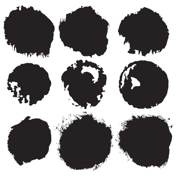 Scratched blots of black paint — Stock Vector