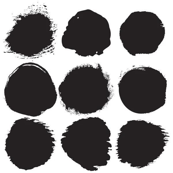 Manchas riscadas de tinta preta — Vetor de Stock