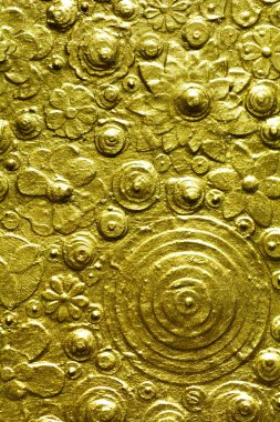Altın dokulu yüzeyi.