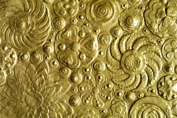 Flores douradas superfície fundo — Fotografia de Stock