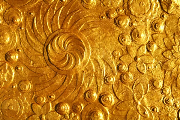 Golden flowers embossing — Stock Photo, Image