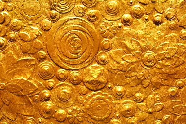 Golden flowers embossing — Stock Photo, Image