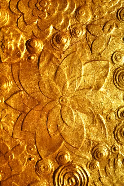 Golden flowers embossing — Stock Photo, Image