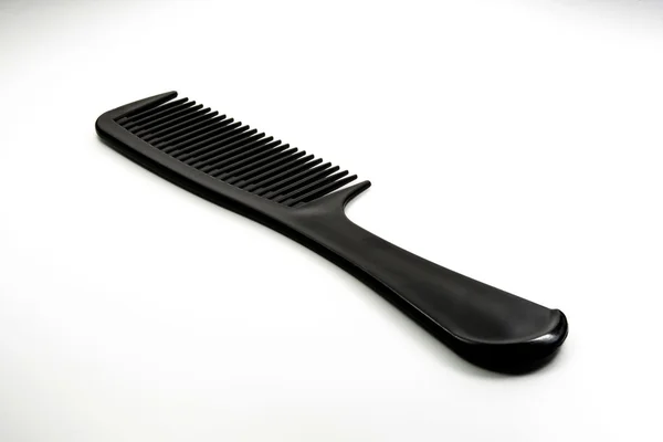 Preto cabeleireiro ferramenta no fundo branco — Fotografia de Stock