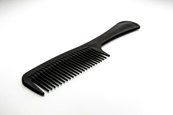 Black hairdresser tool on white background — Stock Photo, Image