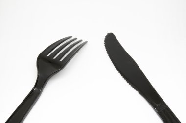 siyah plastik çatal ve bıçak