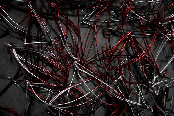 Resíduos de fio de alumínio vermelho no chão — Fotografia de Stock